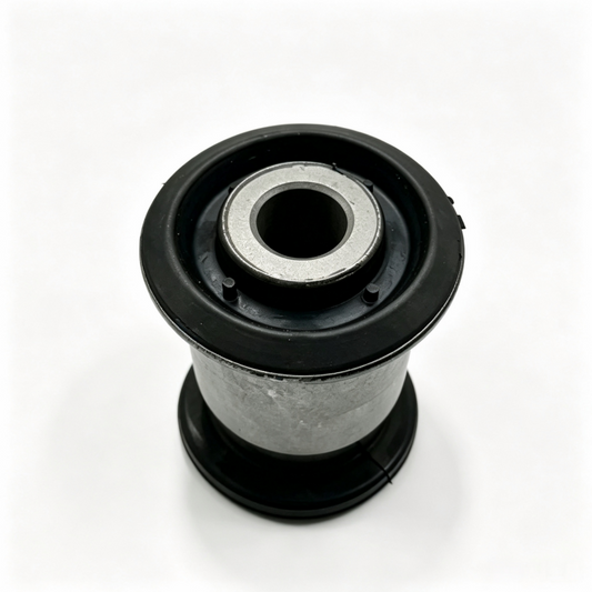 Front control arm bushing end view: black rubber base with metal inner ring