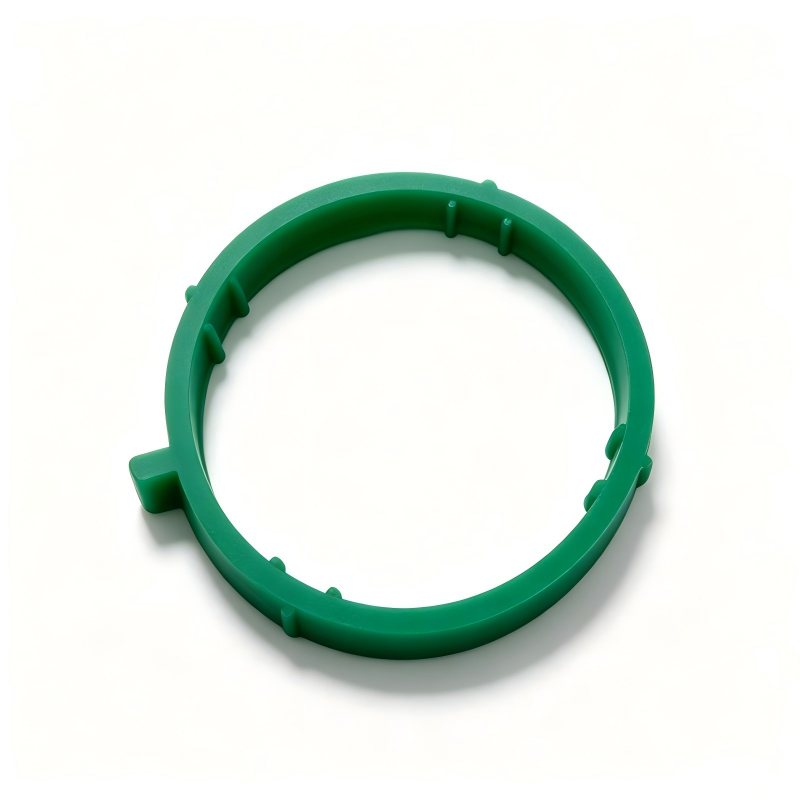 Green circular intake pipe sealing ring, with side tabs and molded stops.