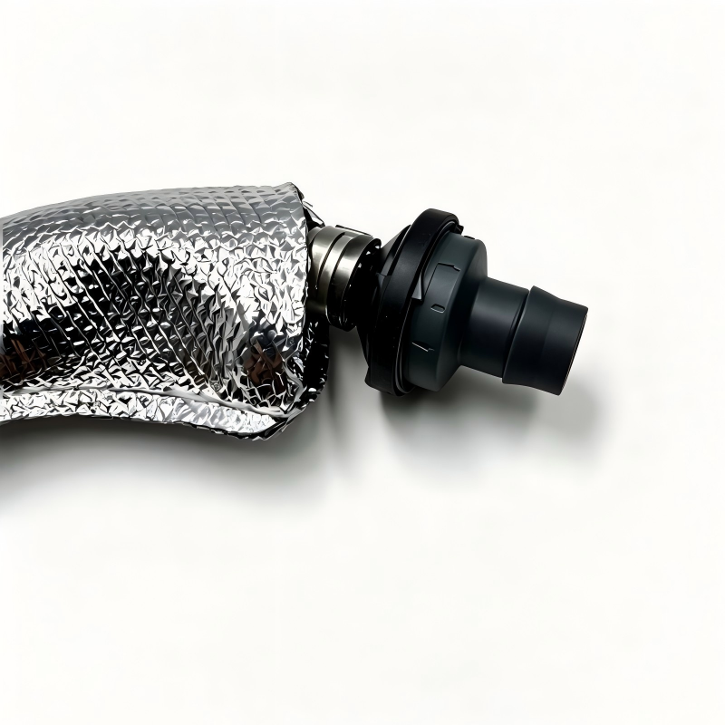 Turbo boost pipe with valve, silver braided section with black valve housing