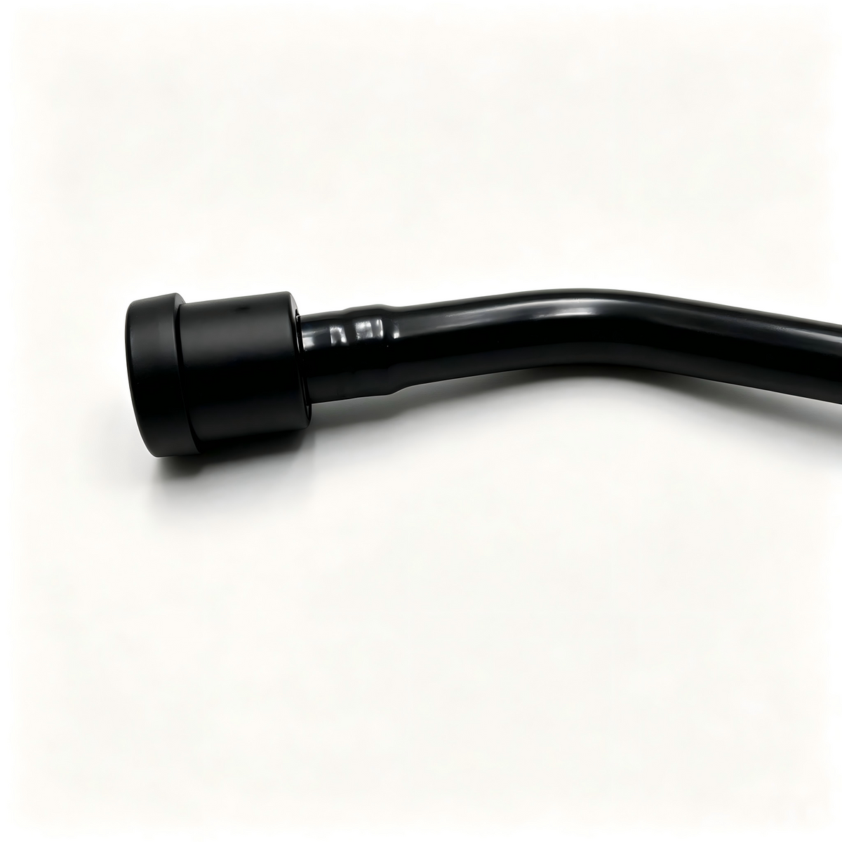 Black coolant pipe hose with large mounting connector, side view