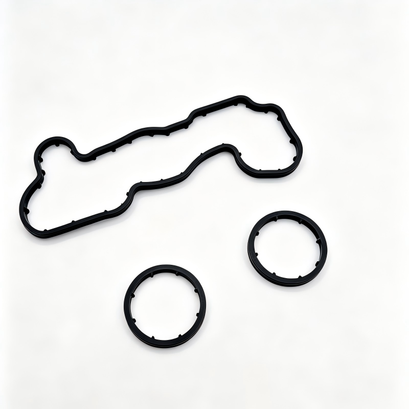 Oil cooler seal set with one long gasket and three circular seals, black rubber