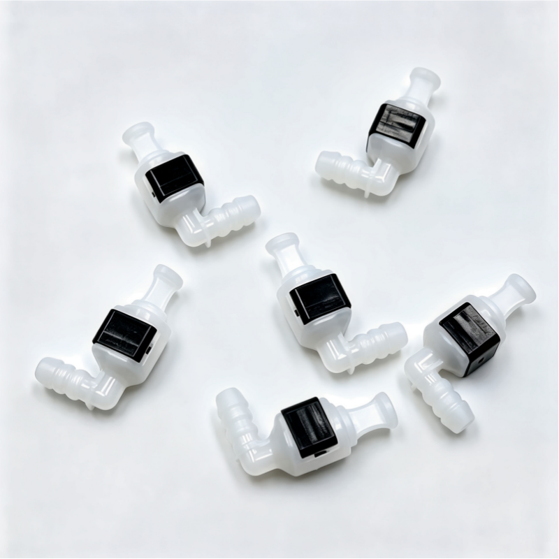 Set of white coolant hose connectors with black square inserts, front view