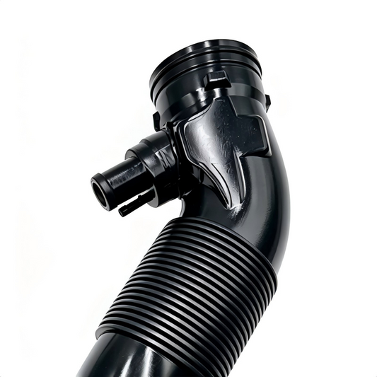 Black intake hose with molded elbow bend and ribbed corrugated section