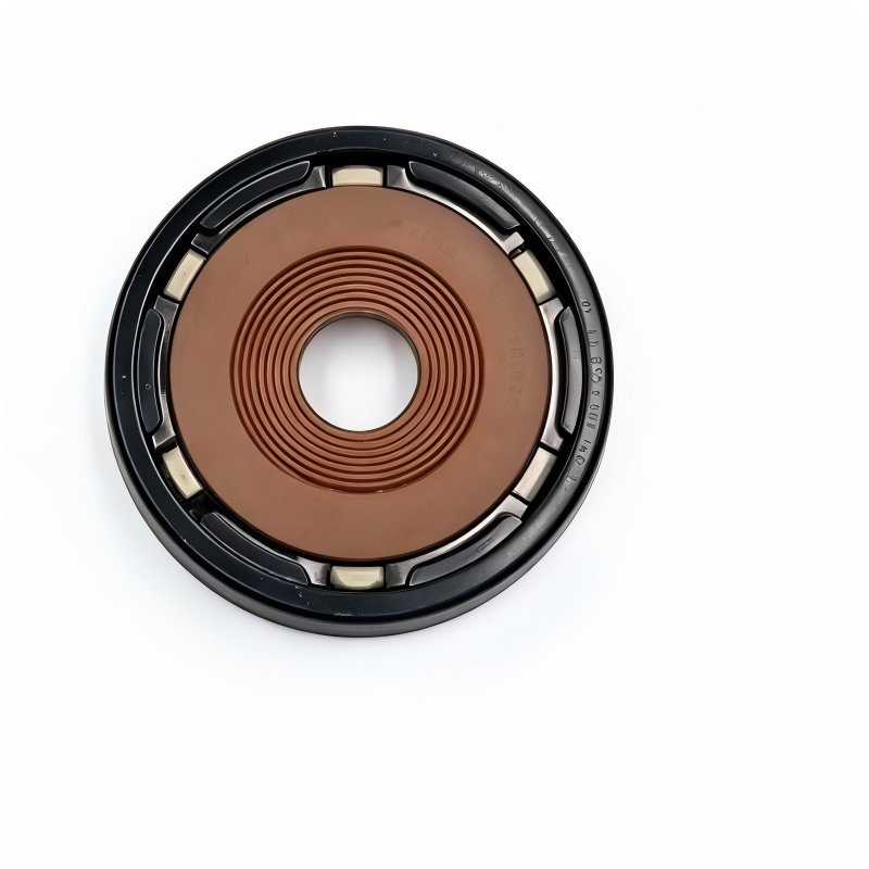 Crankshaft oil seal, round black housing with brown rubber center and small metal tabs