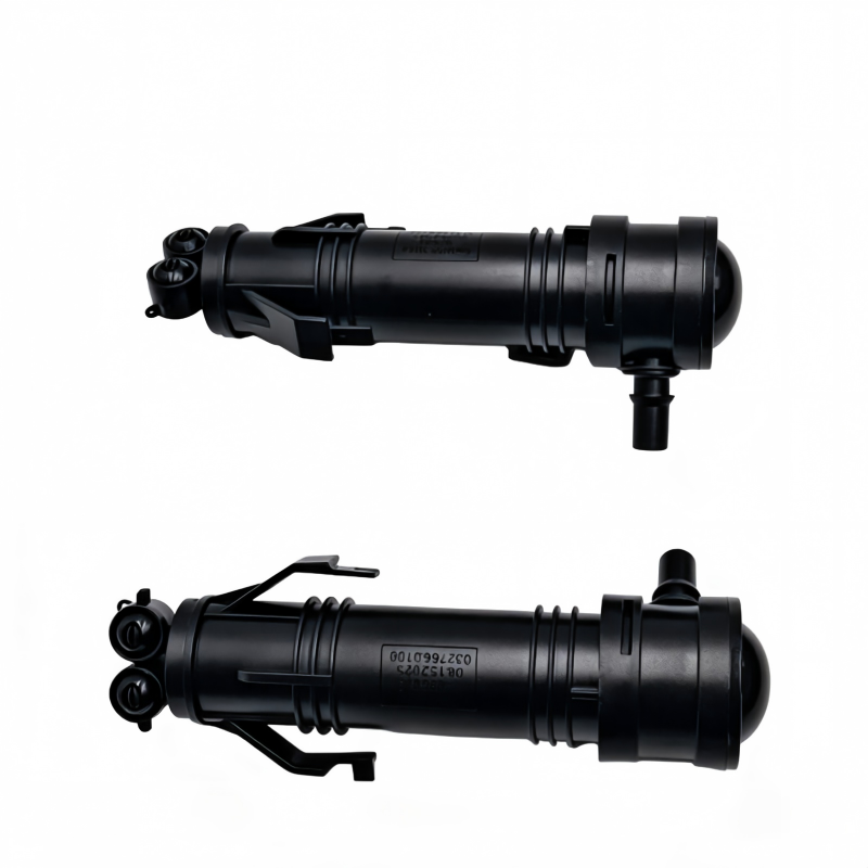 Pair of black headlight washer nozzles, showing left and right side fittings