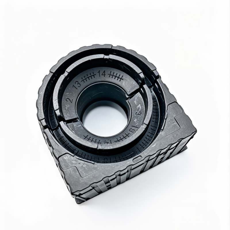 Stabilizer bar bushing component with rubber ring and molded scale markings on metal shell