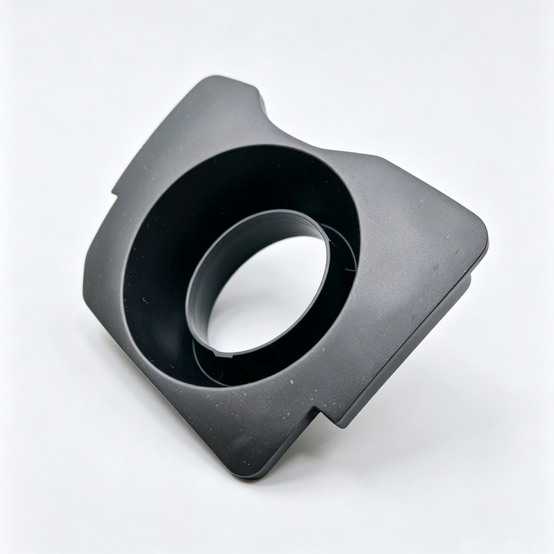 Black ignition coil boot with large circular opening and molded housing