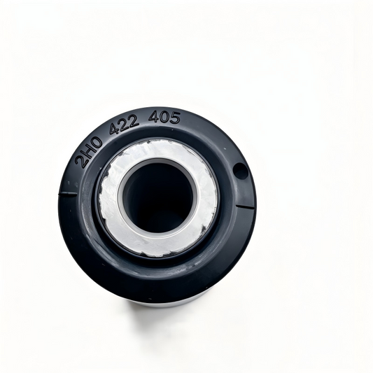Black steering rack bushing end view with silver inner sleeve and stamped code