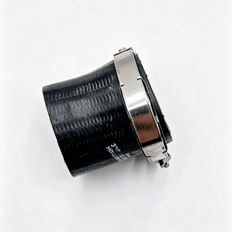 Turbo boost pipe section with black hose and silver clamp, side view