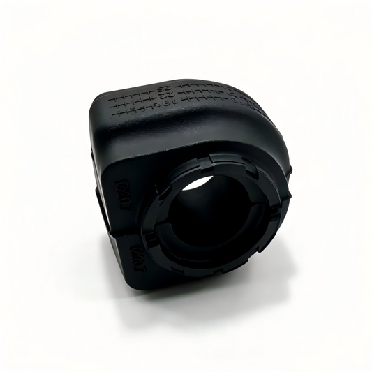 Front stabilizer bar bushing, black rubber housing with circular mounting opening