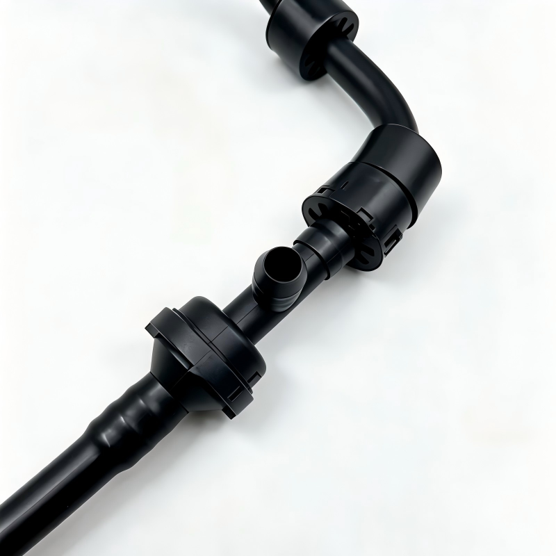 Black vacuum hose with two barbed couplers and inline connector