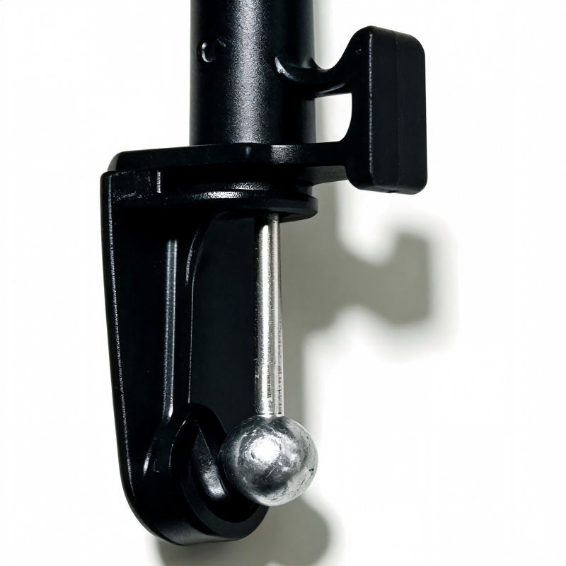 Hood latch release bracket with black housing and silver ball joint