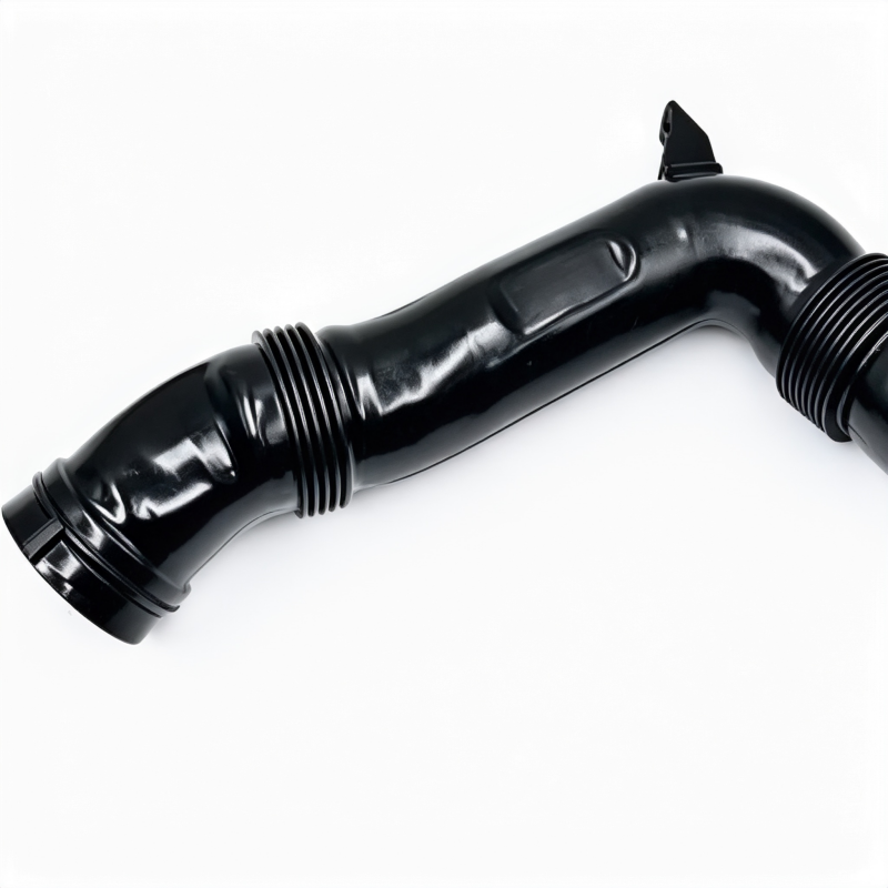 Black ribbed air intake hose with L-bend and two threaded outlet ends