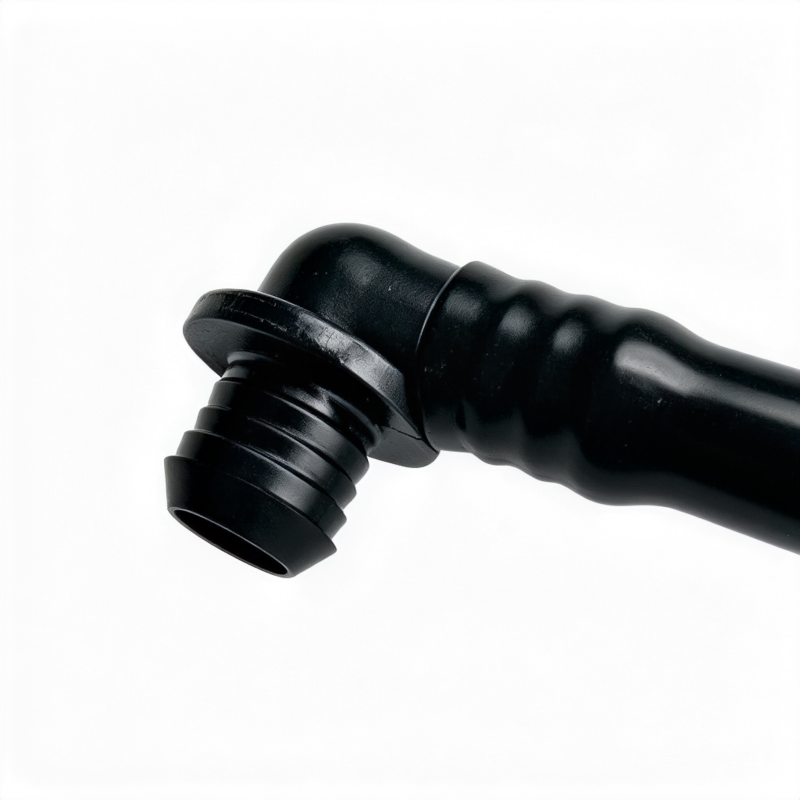 Crankcase vent hose elbow with ribbed black plastic connector and hose end