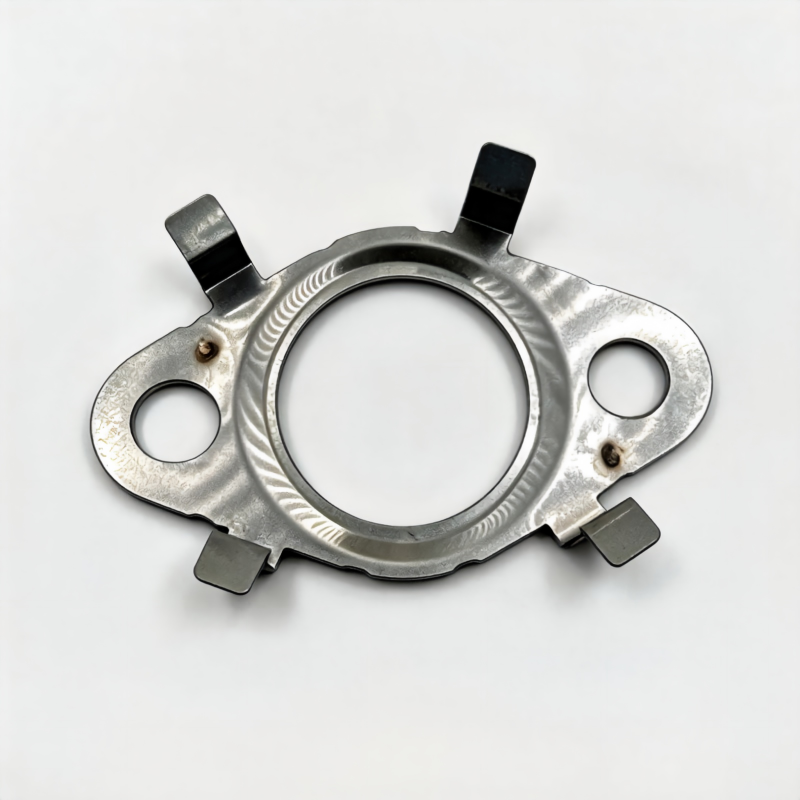 Metal oil line seal ring with four mounting clips and side holes