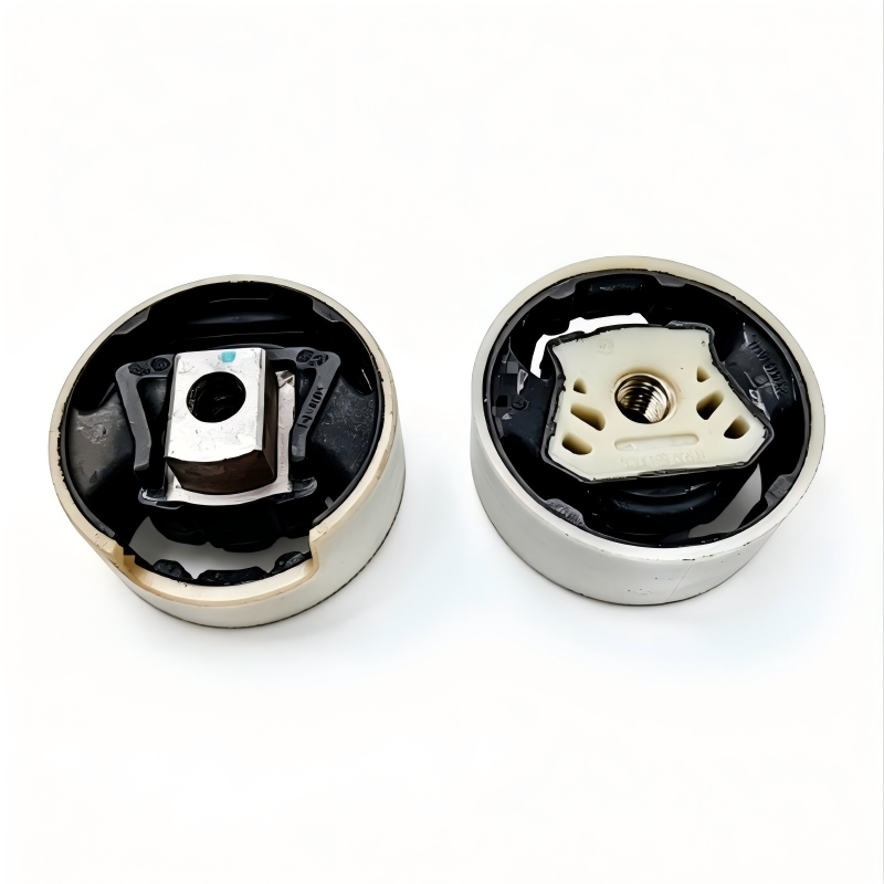 Left and right suspension subframe bushing mounts, rubber with metal threaded insert