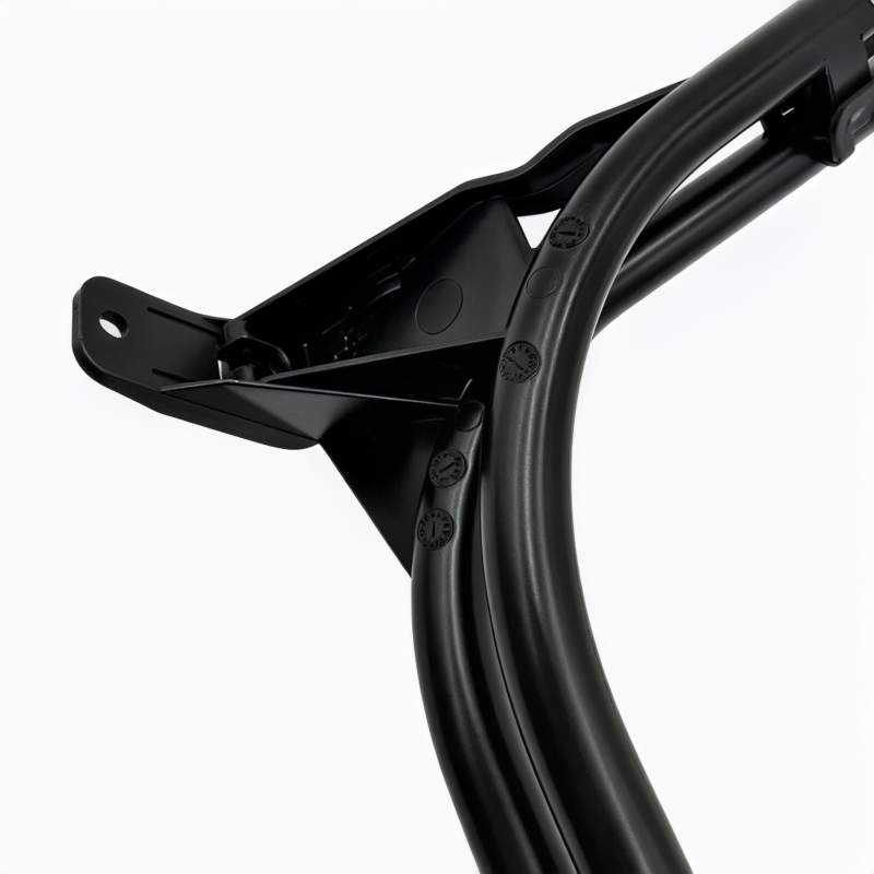 Black coolant pipe bracket with mounting holes and integrated hose sections