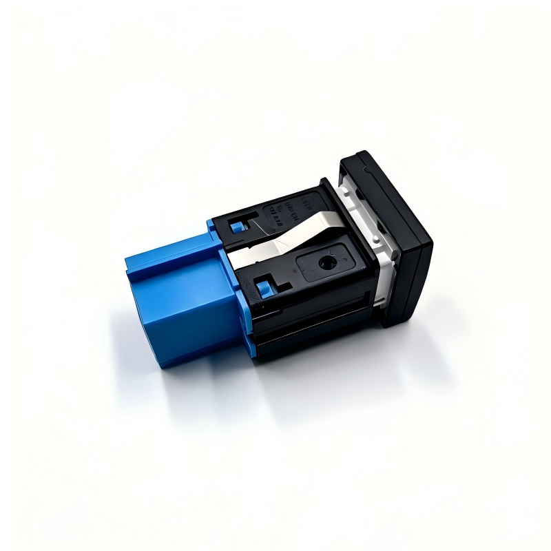 Tire pressure monitor switch, black body with blue housing and exposed internal contacts