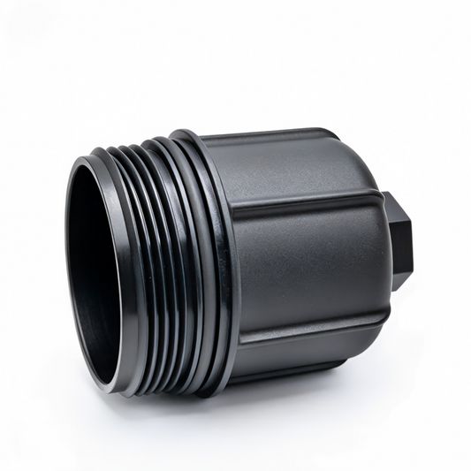Oil filter housing with side threads and mounting tab