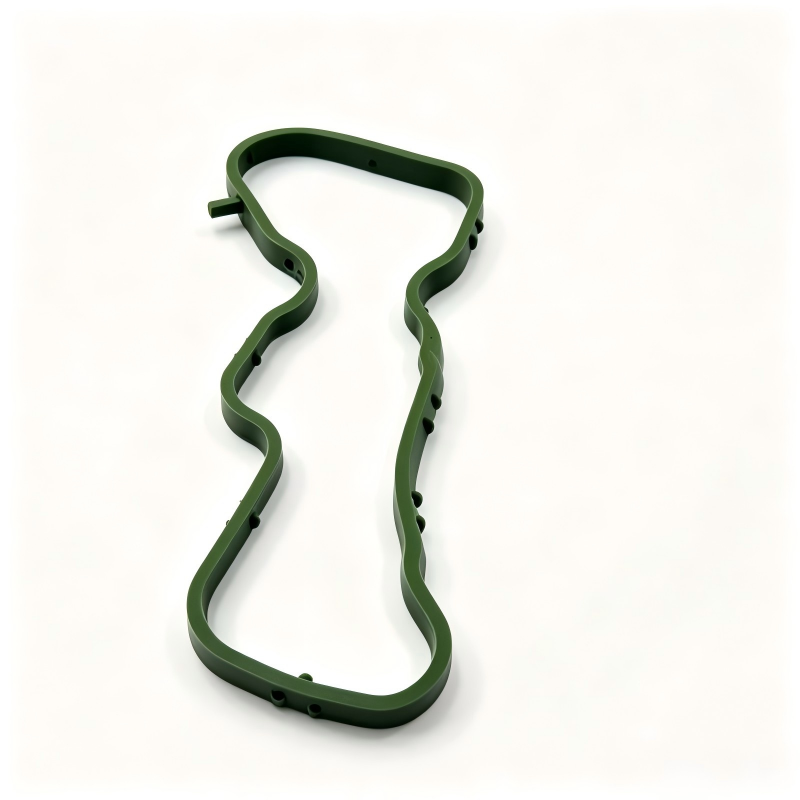 Left intake manifold gasket, green molded gasket outline with wavy edges and holes