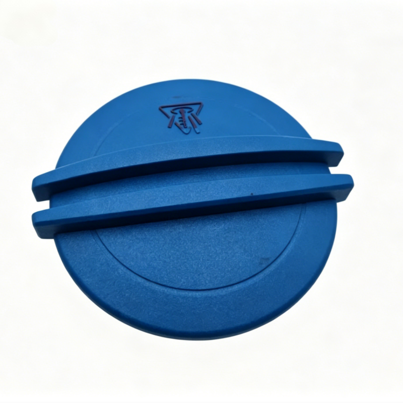 Coolant reservoir cap, blue plastic with embossed emblem and ridged top seal