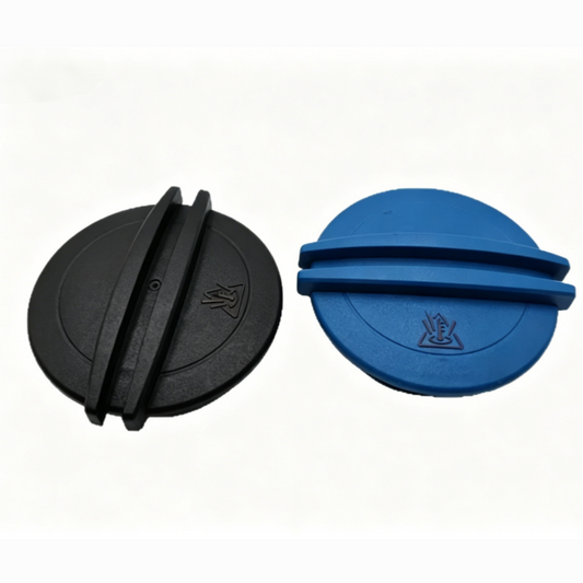 Coolant reservoir cap, black plastic with ridged grip and embossed seal symbol