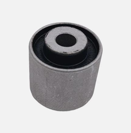 Control arm bushing with gray outer sleeve and black rubber core, top view
