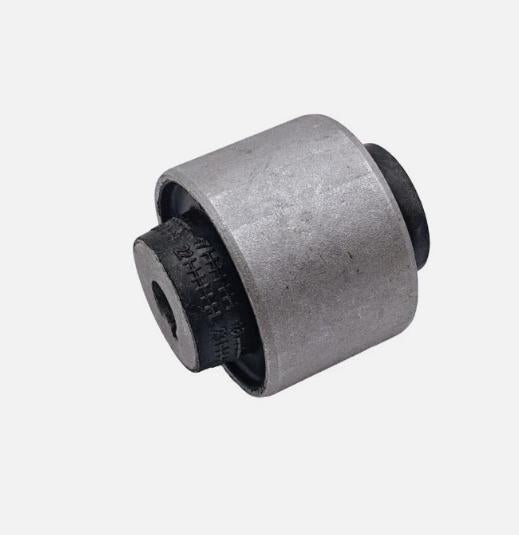 Control arm bushing with black rubber edge, metal sleeve, circular side mount.
