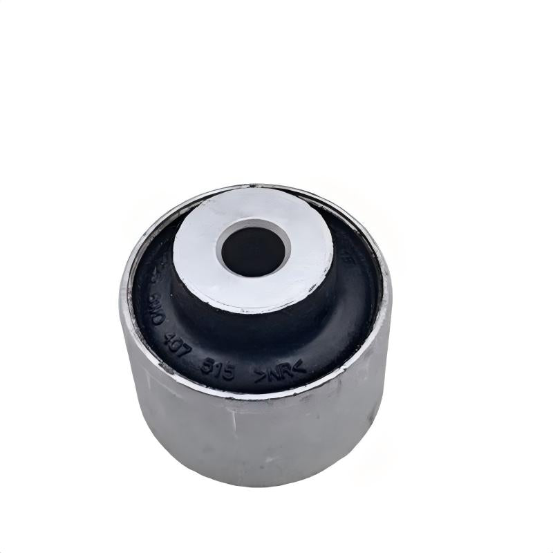 Control arm bushing with black rubber insert and metal housing, front view