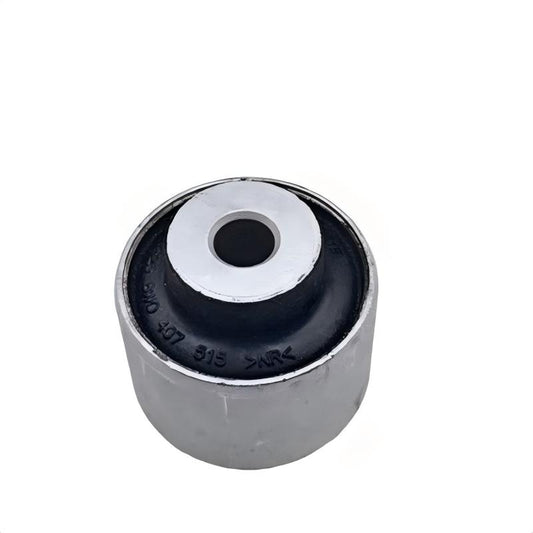Control arm bushing with black rubber insert and metal housing, front view
