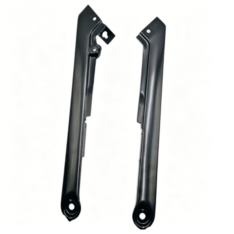 Pair of black headlight mounting brackets with circular mounting holes and metal tabs