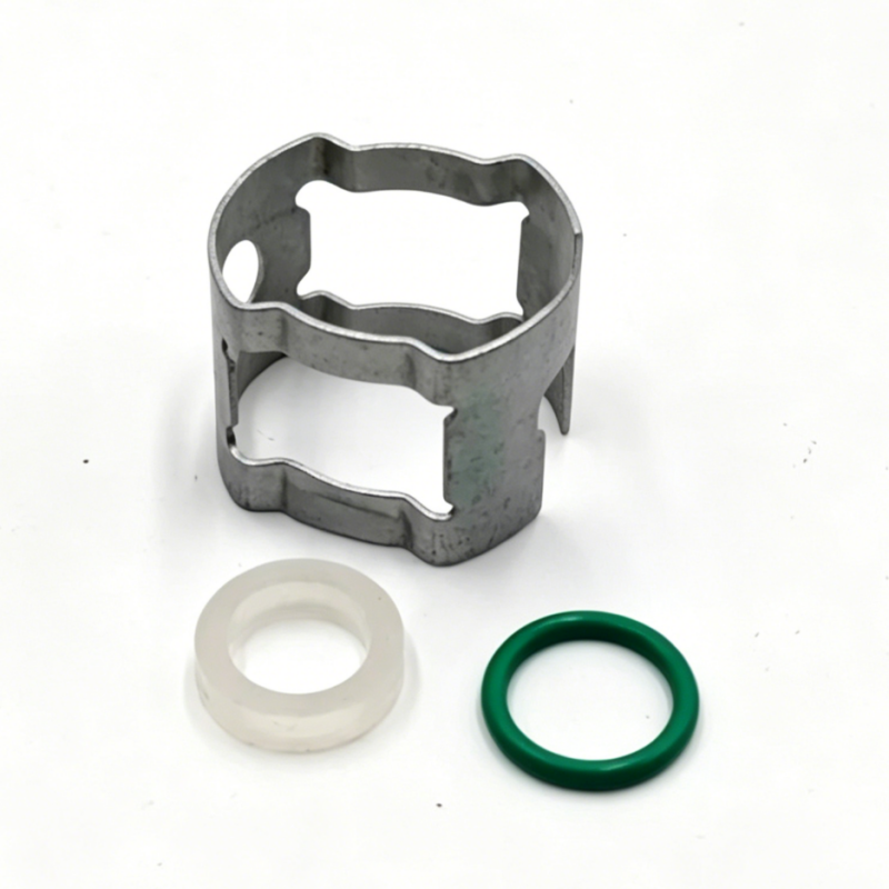 Transmission oil line clip repair kit: dark metal clip with white sleeve and green seal ring