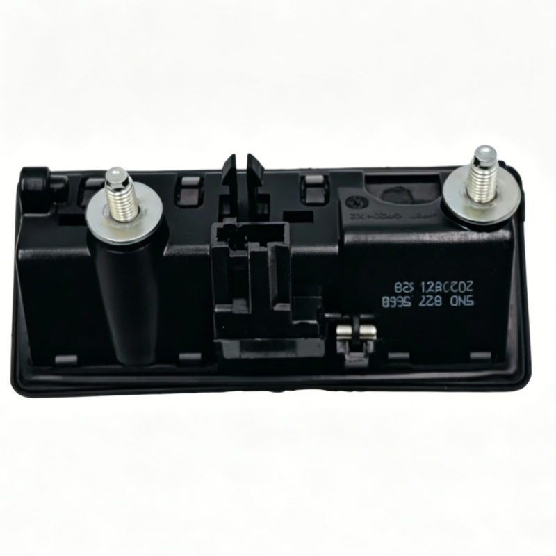 Black tailgate handle mechanism with two mounting screws and central latch