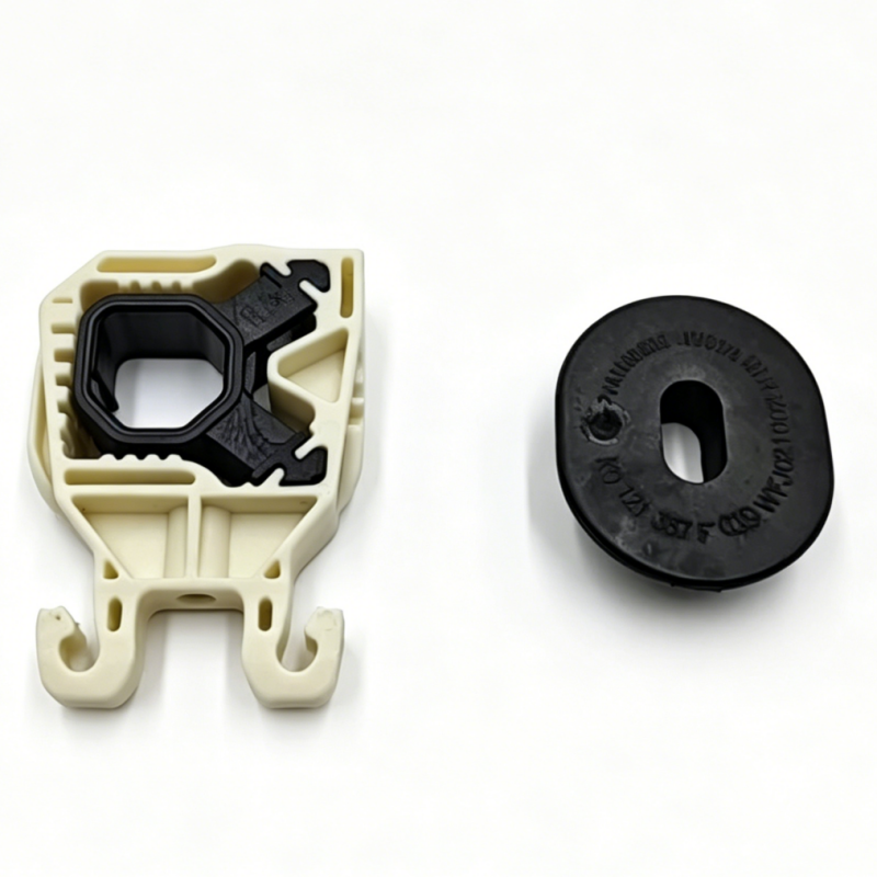 Beige radiator support bracket with black circular bushing