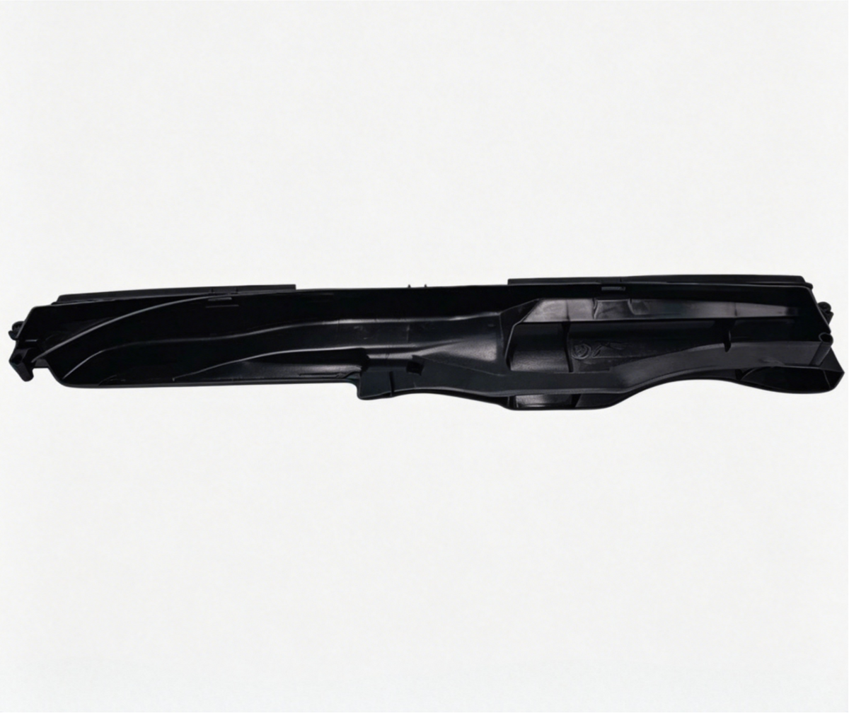 Black plastic air intake duct set with molded channels and mounting clips