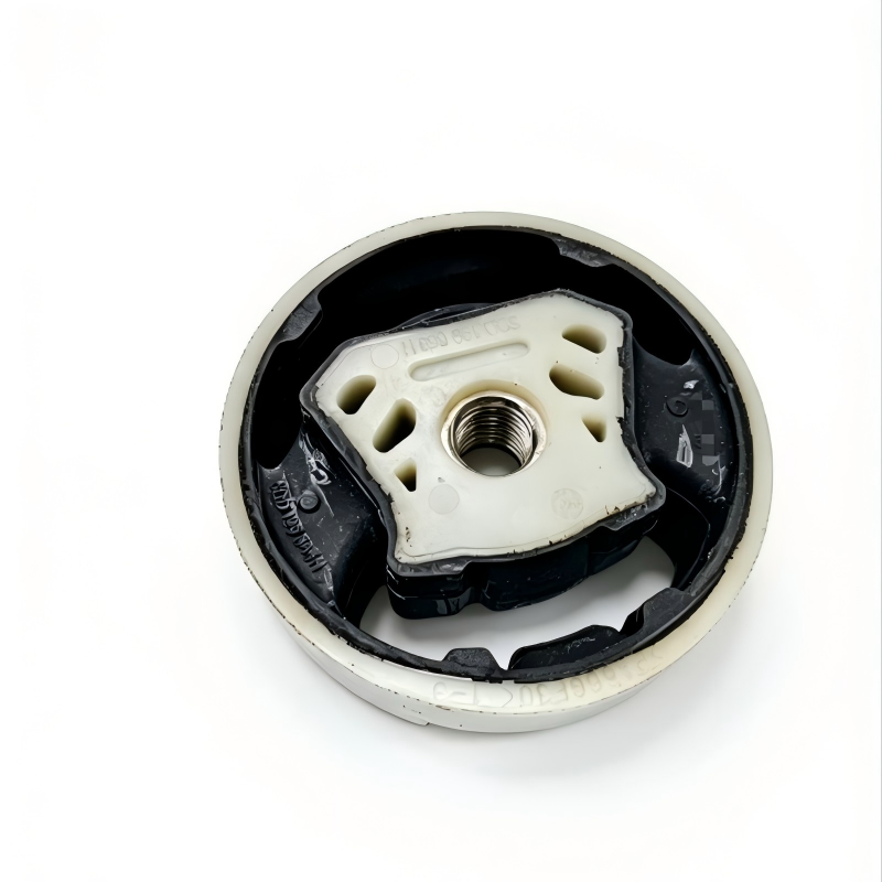Suspension subframe bushing mount pair with rubber body and metal threaded insert