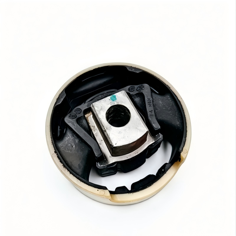 Suspension subframe bushing mount pair with rubber body and stamped steel insert