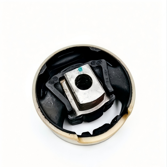 Suspension subframe bushing mount pair with rubber body and stamped steel insert