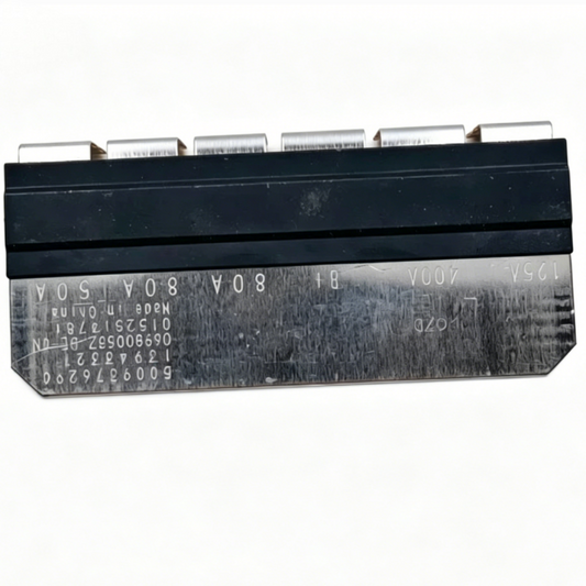 Multi-fuse strip for VW: black base with metal fuse terminals and printed numbers