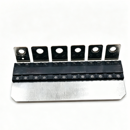 Fuse strip terminal block with six metal posts, black housing, and row of fuse positions