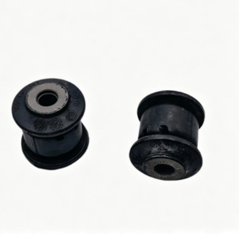 Control arm bushing pair: black rubber with metal sleeve and central hole