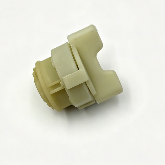 Plastic tail light mounting retainer, off-white with snap tabs and central recess