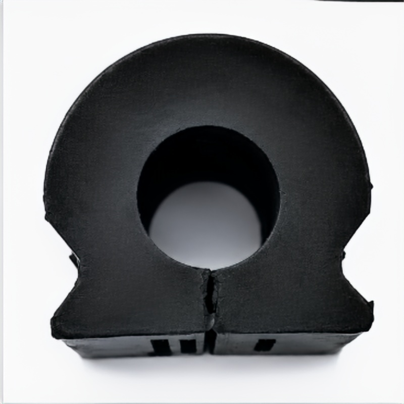 Black rubber stabilizer bar bushing with central mounting hole