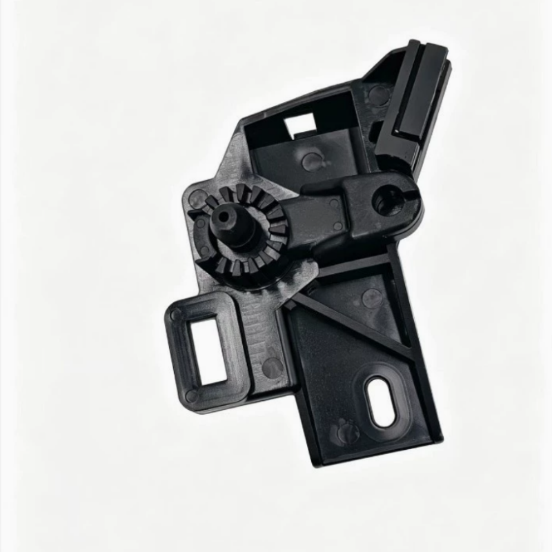 Black hood release latch mechanism assembly with gears and mounting tabs