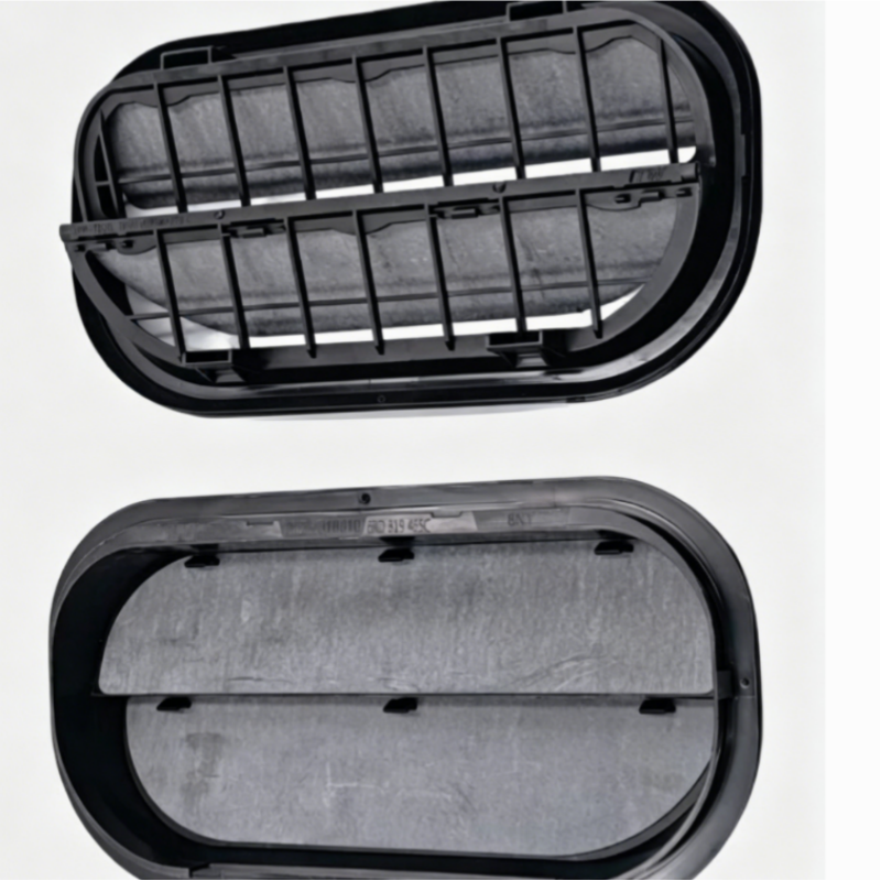 Rear bumper air vent insert set with black frame, slats, and backing panel