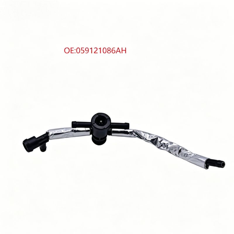 Coolant reservoir hose with black valve-like fitting and curved silver corrugated tubing