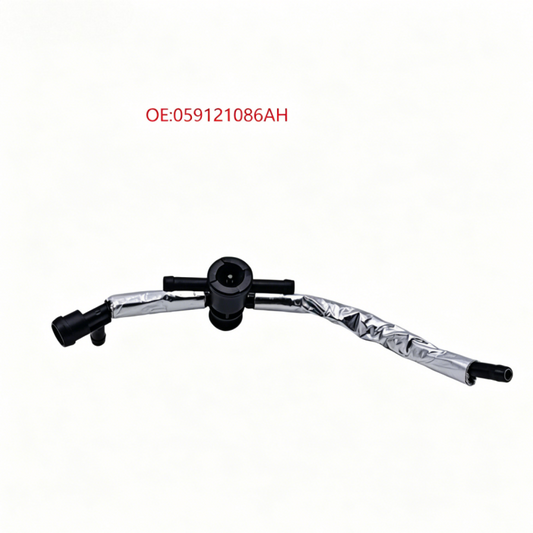 Coolant reservoir hose with black valve-like fitting and curved silver corrugated tubing