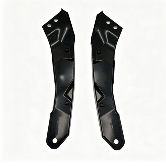 Pair of black headlight mounting brackets with bolt holes