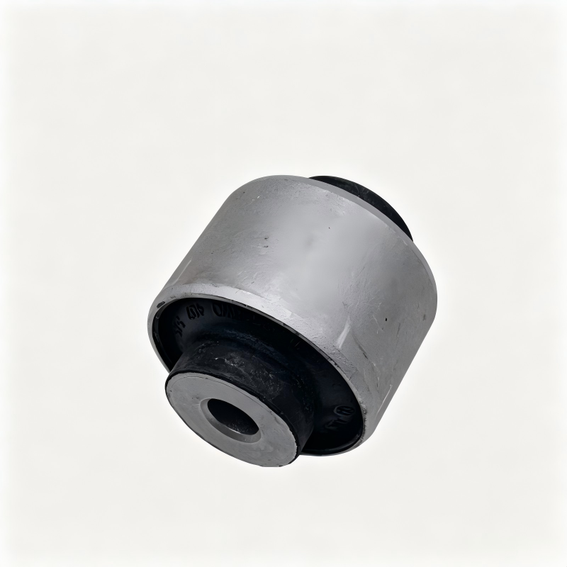 Control arm bushing with black bushing ring, metal outer shell, side view