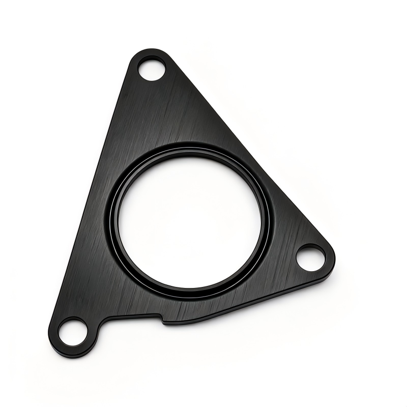 Black triangular oil line seal gasket with circular center opening and two bolt holes